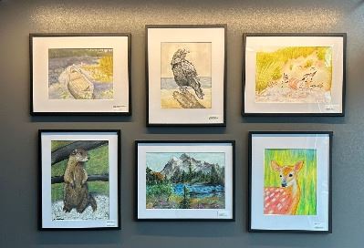 Images of 4 art pieces at Trailhead.