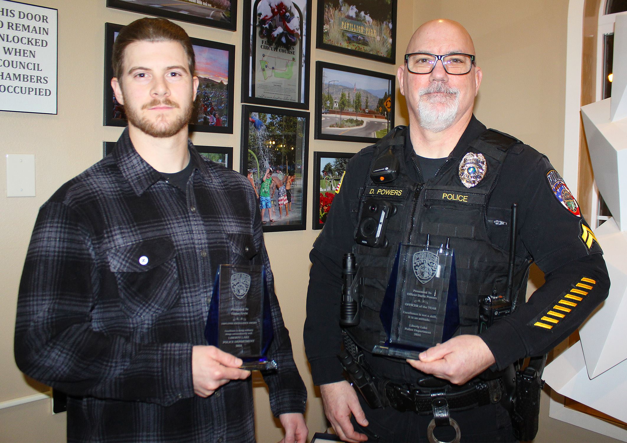 Logan Ervin and Darin Powers holding awards