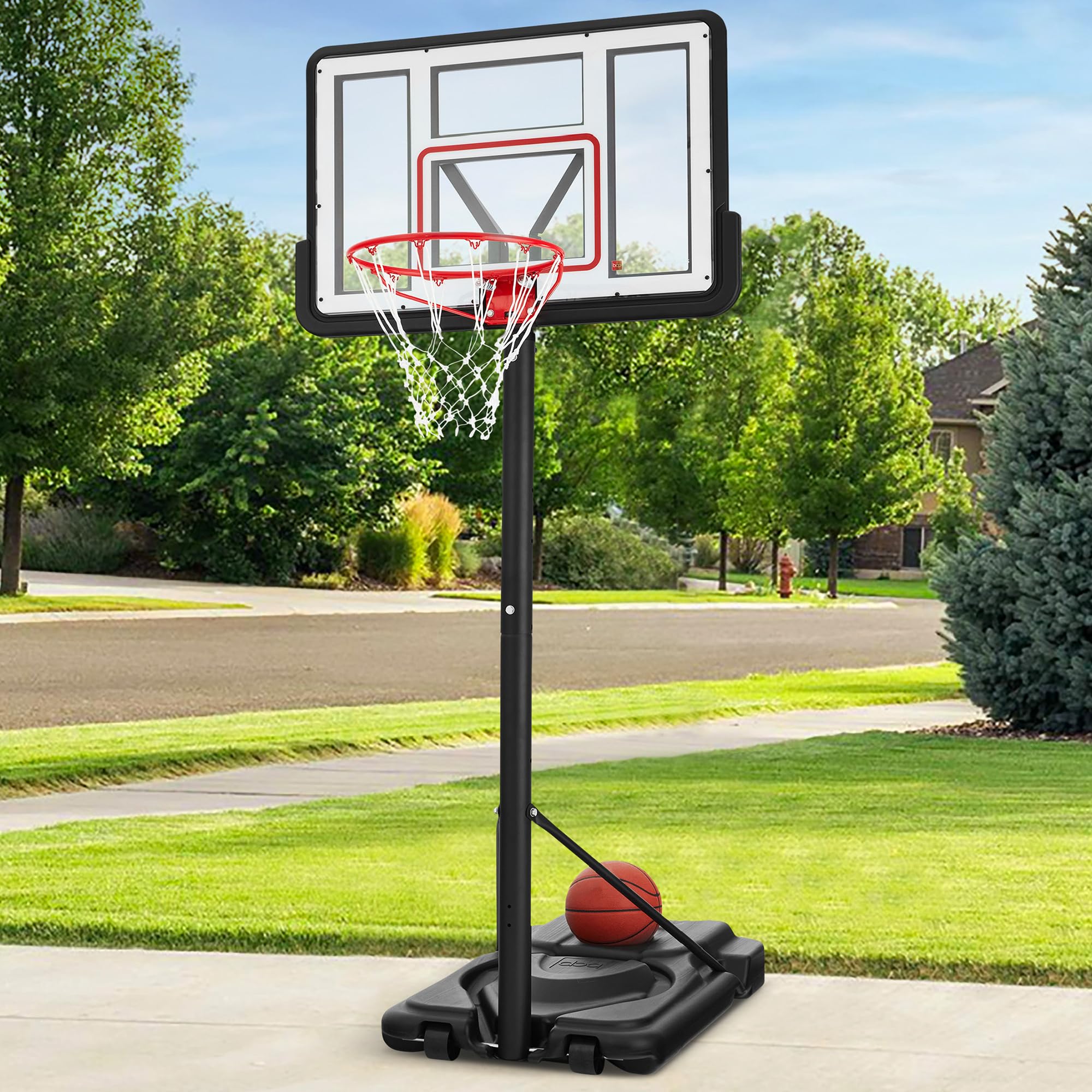 Portable basketball hoop in driveway